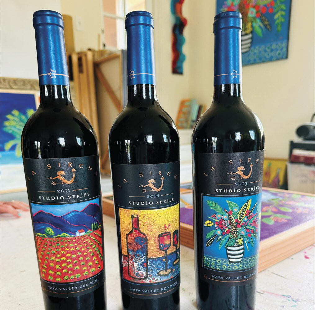 3 bottles of La Sirena wine with painted labels by Heidi Barrett