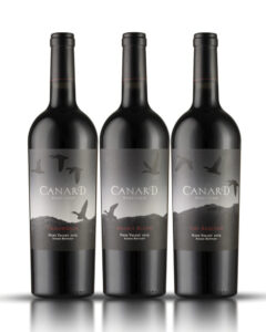 image of 3 black bottles of wine with Canard Vineyard logo