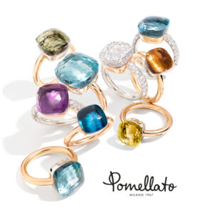 collection of colorful gems stones on yellow gold bands by Pomellato