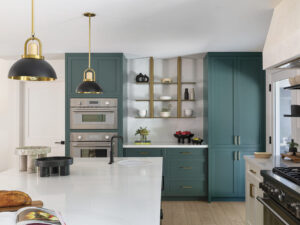 interior of kitchen with teal cabinets