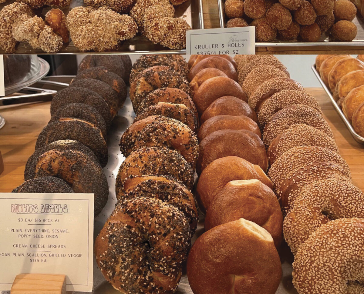 display of various pastries including bagels