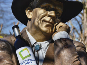 Yountville Art Walk Sidewalk Judge copper sculpture/statue, with bottle of wine with label Yountville Arts