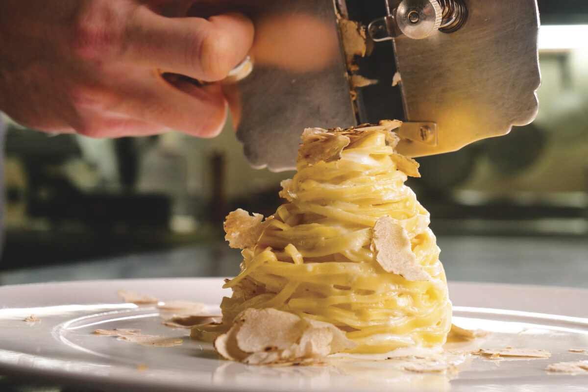 Egg pasta dish, typical Italian, with fine white truffle grated for the article Piedmont's Bounty