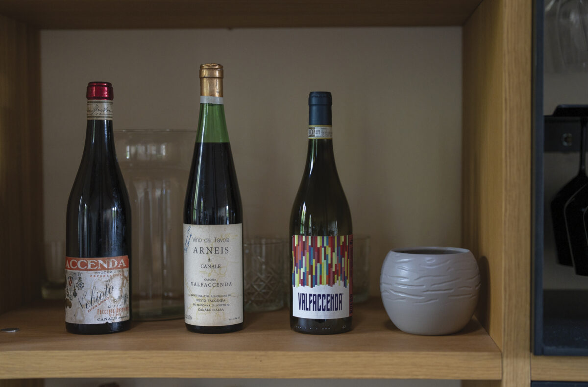 3 bottles of Valfaccenda wine on wood shelf with gray bowl for the article Piedmont's Bounty